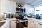 Upgraded kitchen with amenities and supplies to get your vacation started